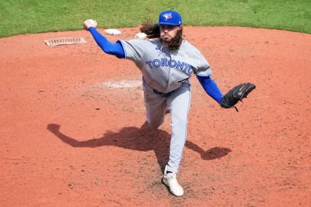 Toronto Blue Jays starting pitcher Spencer Arrighetti (45) delivers a pitch against the Kansas City Royals during the fourth inning at Kauffman Stadium.