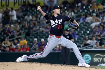 Minnesota Twins pitcher Jeff Hoffman (24) throws a pitch against the Athletics during the eighth inning at Sutter Health Park.