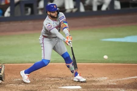 New York Mets designated hitter Bo Bichette (19) hits a single in the ninth inning against the Miami Marlins at loanDepot Park