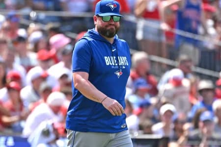 Toronto Blue Jays manager John Schneider (14) walks to the mound to make a pitching change against the Philadelphia Phillies during the sixth inning at Citizens Bank Park.