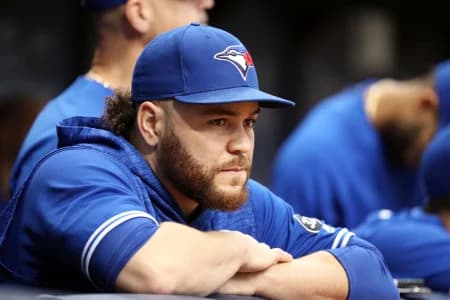 Toronto Blue Jays catcher Russell Martin (55) looks on from the dugout against the Tampa Bay Rays at Tropicana Field.