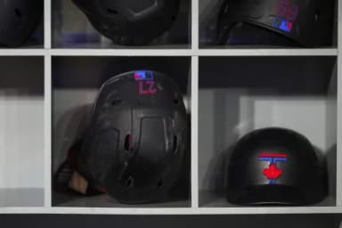 The City Connect helmet of Toronto Blue Jays first baseman Vladimir Guerrero Jr. (27) rests in the dugout before a MLB game against the Cleveland Guardians at Rogers Centre