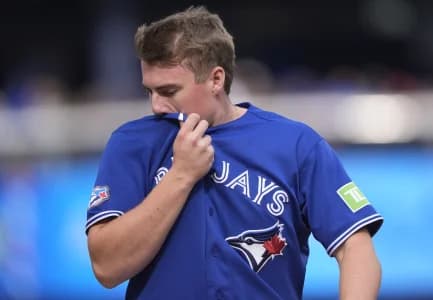 Toronto Blue Jays first baseman Sean Keys (20) comes off the field after being stranded on base against the Cincinnati Reds during the second inning at Rogers Centre.