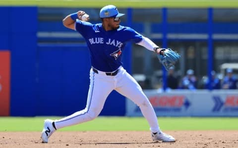Toronto Blue Jays shortstop Leo Jimenez (49) throws the ball to first base for an out during the second inning against the Baltimore Orioles at TD Ballpark.