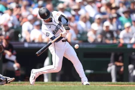 Seattle Mariners left fielder Taylor Ward (27) singles in the third inning against the Detroit Tigers at T-Mobile Park.