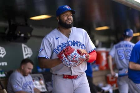 Toronto Blue Jays first baseman Vladimir Guerrero Jr. (27) walks in the dugout during a break in the action against the Athletics in the sixth inning at Sutter Health Park.