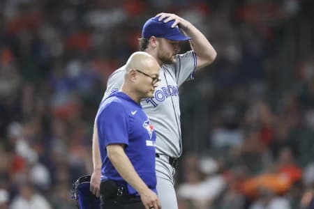 Toronto Blue Jays starting pitcher Trey Yesavage (39) walks off the field after an apparent injury during the third inning against the Houston Astros at Daikin Park