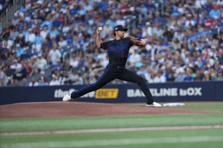 Toronto Blue Jays start pitcher Shane Bieber (57) throws a pitch against the New York Yankees during the first inning at Rogers Centre.