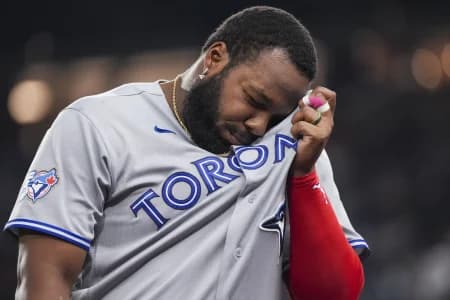 Toronto Blue Jays first baseman Vladimir Guerrero Jr. (27) walks to the dugout after the end of the fifth inning against the Texas Rangers at Globe Life Field.