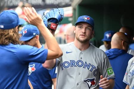 Toronto Blue Jays pitcher Trey Yesavage (39) is congratulated by teammates after leaving the game against the Washington Nationals during the seventh inning at Nationals Park.