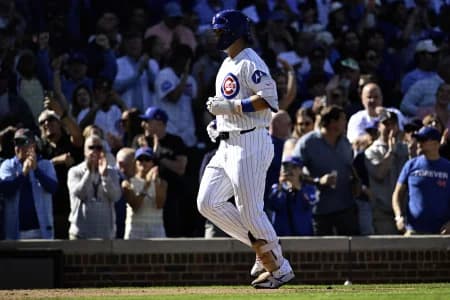 Chicago Cubs right fielder Seiya Suzuki (27) rounds the bases after he hit a home run during the fifth inning against the Miami Marlins at Wrigley Field.