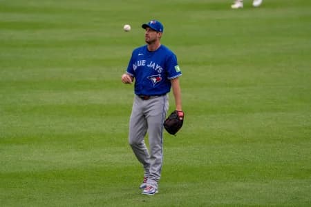 Toronto Blue Jays pitcher Max Scherzer (31) tosses the ball before the game at Oriole Park at Camden Yards.