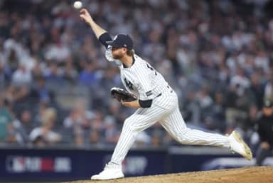 New York Yankees pitcher Paul Blackburn (58) pitches against the Boston Red Sox during the seventh inning during game one of the Wildcard round for the 2026 MLB Playoffs at Yankee Stadium
