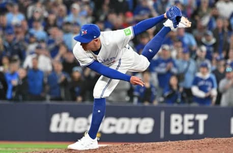 Toronto Blue Jays relief pitcher Chad Green (57) delivers a pitch against the Seattle Mariners in the ninth inning at Rogers Centre.